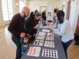 Educators from the National Museum of Women in the Arts helped visitors create their own mini-museums by selecting works by women artists and building a flip-book. In keeping with their #5WomenArtists campaign, the activity encouraged participants to learn the names of women artists, such as Chakaia Booker, Louise Dahl-Wolfe, Georgia Mills Jessup, Lucy M. Lewis, Sarah Miriam Peale, Amy Sherald, and Alma Woodsey Thomas.