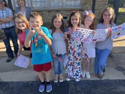Daughters were given student artwork and flowers