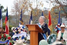 DAR President General Ginnie Sebastian Storage speaking during the Battle of Great Bridge Commemoration 