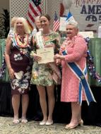 President General Storage sashed our state’s Outstanding Junior with a specially made Hawaiian sash