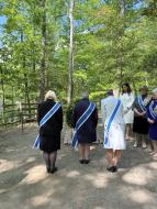 Executive Board members observe a moment of silence at The Slave Memorial and African American Burial Ground at Mt. Vernon