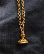 Gold watch chain, c. 1770; watch seal with engraved amethyst, late 18th century.