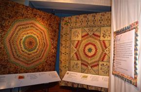 Two pieced quilts in “Eye on Elegance”