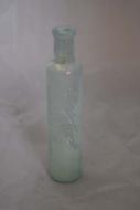 Medicine bottle, “Healy &amp; Bigelow’s Kickapoo Indian Oil”