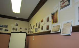 The new exhibit is a joint effort among all the museum’s curators. So everyone can visualize the objects and the narrative they tell we work with photos of objects to organize and plan.