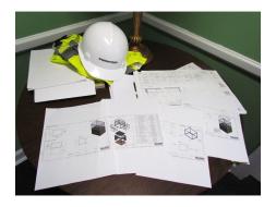 All sorts of plans go into the creation of the new galleries from floor plans (top) to shop drawings of individual cases (bottom).